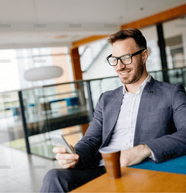 demo-attachment-2831-businessman-taking-a-break-with-a-cup-of-coffee-JW4B3DH